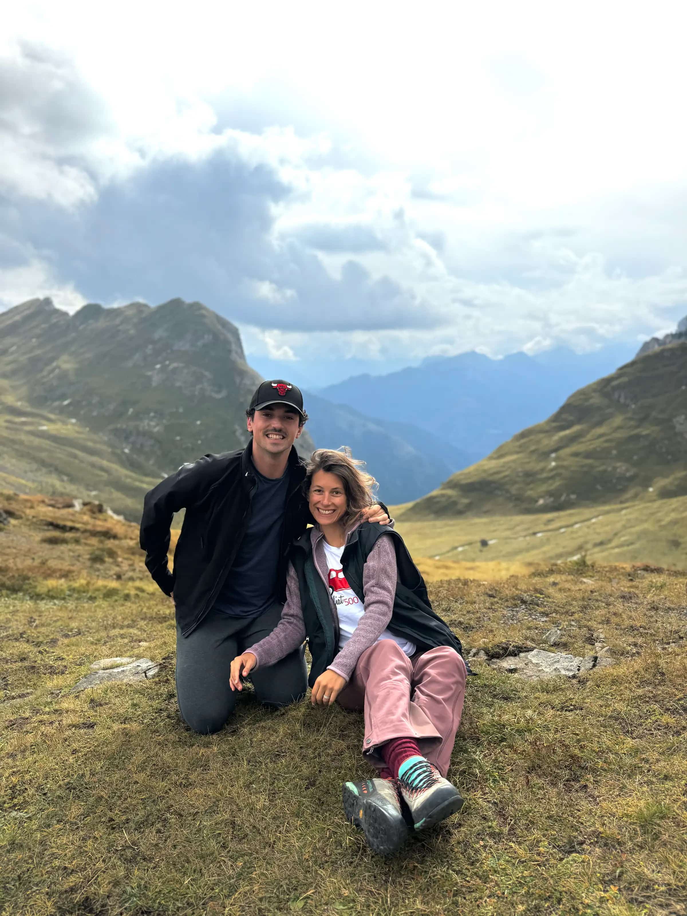Francesca and Roberto together in the Dolomites, the peaks rising behind them